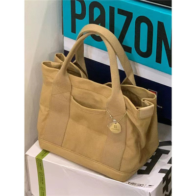 2024 NEW HIGH-END SENSE OF NICHE DESIGN Canvas TOTE BAG tas wanita mode semua vintage tunggal bahu tas crossbody