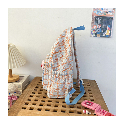 Tingkat penampilan yang tinggi tas cek kecil segar sekolah menengah belakang mahasiswa perempuan musim gugur dan musim dingin tas belakang