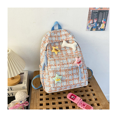 Tingkat penampilan yang tinggi tas cek kecil segar sekolah menengah belakang mahasiswa perempuan musim gugur dan musim dingin tas belakang