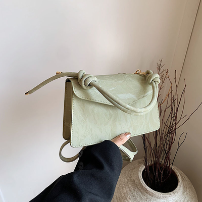 Tas Tangan Berkualitas Tinggi Wanita Tren Baru Mode NICHE Desain Hand Bill of Loading Bahu Tas Semua Tekstur Tas Crossbody