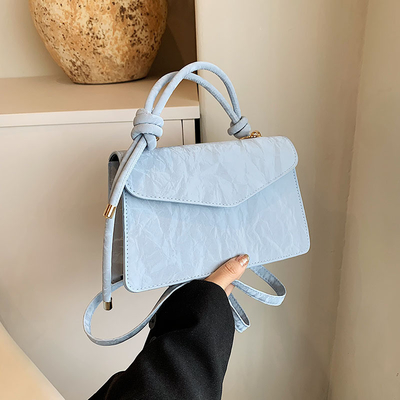 Tas Tangan Berkualitas Tinggi Wanita Tren Baru Mode NICHE Desain Hand Bill of Loading Bahu Tas Semua Tekstur Tas Crossbody
