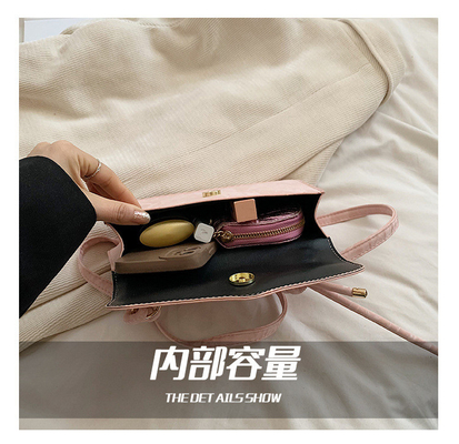 Tas Tangan Berkualitas Tinggi Wanita Tren Baru Mode NICHE Desain Hand Bill of Loading Bahu Tas Semua Tekstur Tas Crossbody