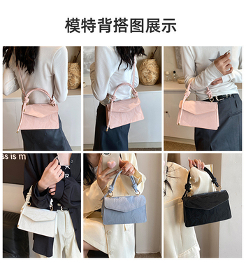 Tas Tangan Berkualitas Tinggi Wanita Tren Baru Mode NICHE Desain Hand Bill of Loading Bahu Tas Semua Tekstur Tas Crossbody