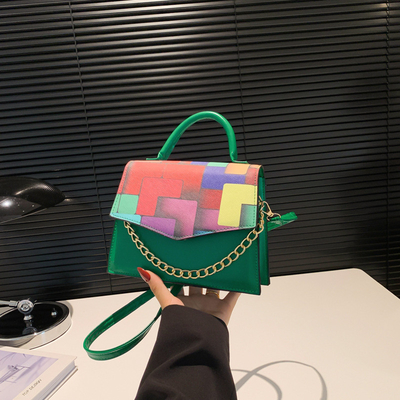 2024 Musim semi/musim panas mode baru tekstur yang cocok warna crossbody tas bahu tas tangan tahun ini