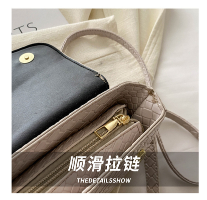 High Sense Fashion Saddle Populer Musim semi/musim panas Tas kecil yang dipintal Tas sederhana All-in-One Tas crossbody