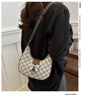Tas lengan bawah ARC DE TRIOMPHE tas wanita musim semi dan musim panas tas bahu semua-dalam-satu tas bulan sabit senior sensing retro cross