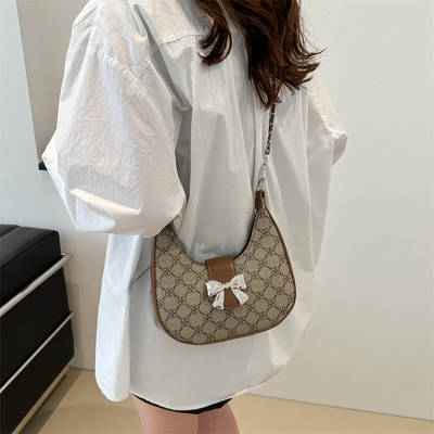 Tas lengan bawah ARC DE TRIOMPHE tas wanita musim semi dan musim panas tas bahu semua-dalam-satu tas bulan sabit senior sensing retro cross
