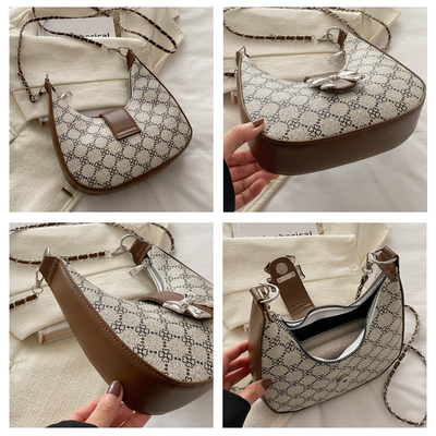 Tas lengan bawah ARC DE TRIOMPHE tas wanita musim semi dan musim panas tas bahu semua-dalam-satu tas bulan sabit senior sensing retro cross