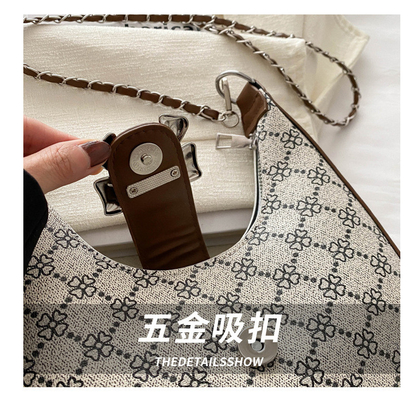 Tas lengan bawah ARC DE TRIOMPHE tas wanita musim semi dan musim panas tas bahu semua-dalam-satu tas bulan sabit senior sensing retro cross