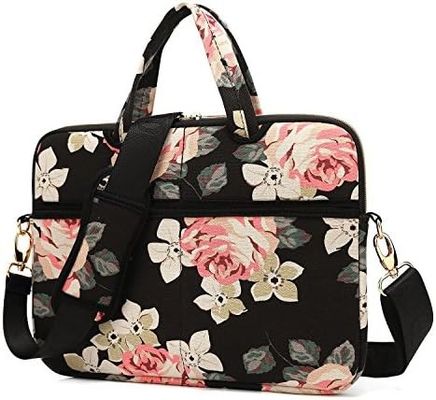 Tas laptop yang dirancang untuk laptop 12,5 hingga 14 inci dengan kain kanvas cetak interior yang dibungkus dan beberapa pilihan membawa