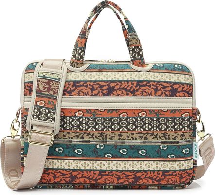 Tas laptop yang dirancang untuk laptop 12,5 hingga 14 inci dengan kain kanvas cetak interior yang dibungkus dan beberapa pilihan membawa