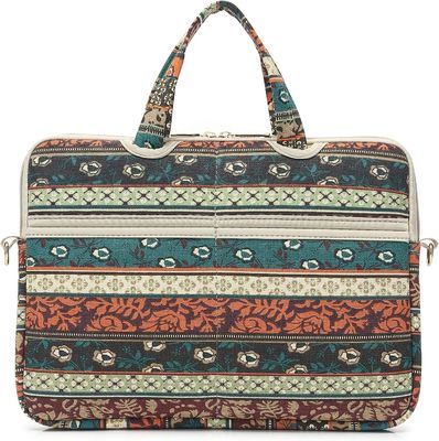 Tas laptop yang dirancang untuk laptop 12,5 hingga 14 inci dengan kain kanvas cetak interior yang dibungkus dan beberapa pilihan membawa