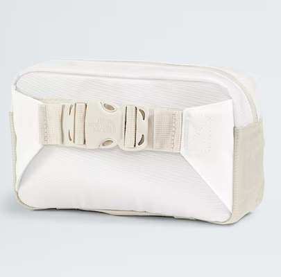 Tas Fanny Packs Kompartemen utama berzipper memiliki kantong kisi-zip yang aman dengan penjepit kunci